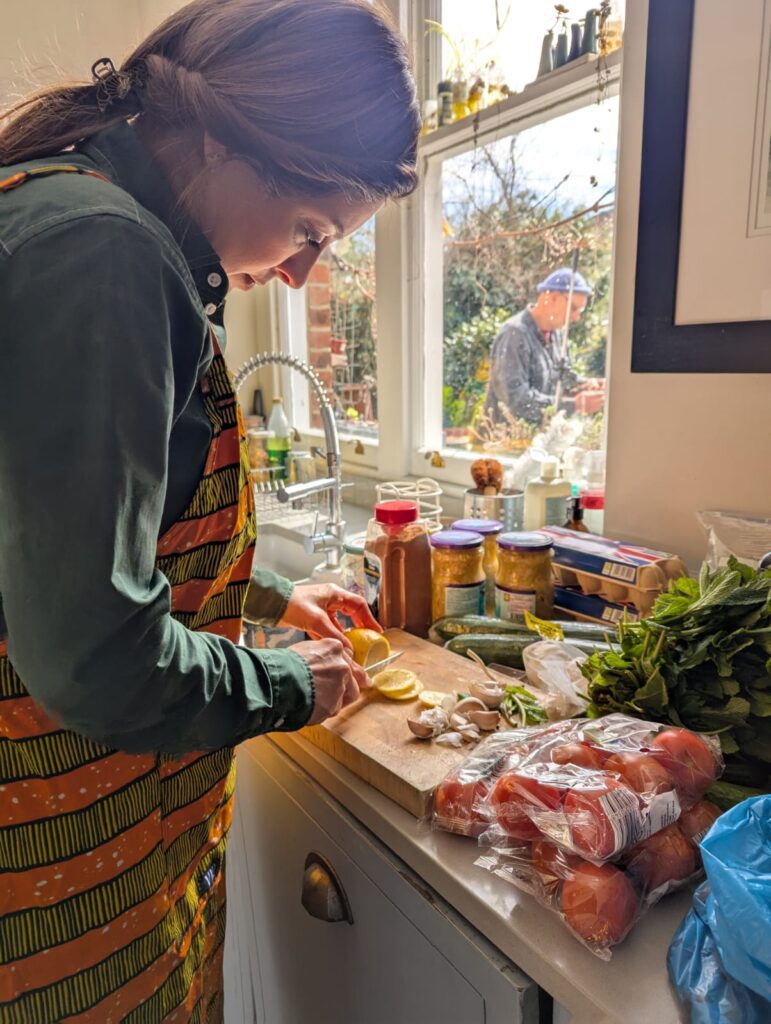 Hadis working in the kitchen
