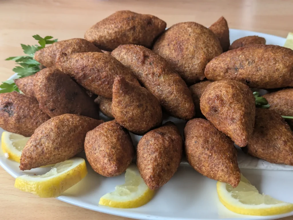 A close up of Kibbeh with Lemon